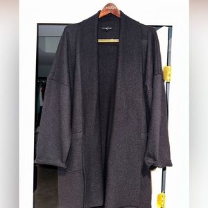 Eileen Fisher black wrap coat or sweater. Tag says medium but fits as a large.